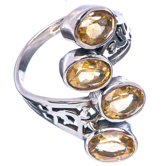 Faceted oval citrine stone ring in polished .925 sterling silver, openwork details