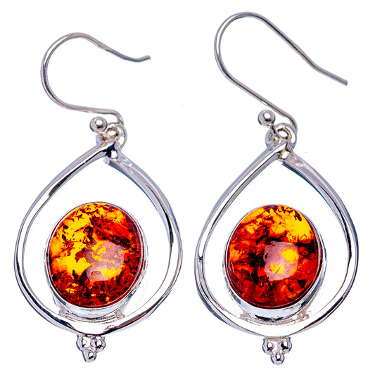 Sterling silver teardrop amber earrings with orange-red cabochon and fishhook backs