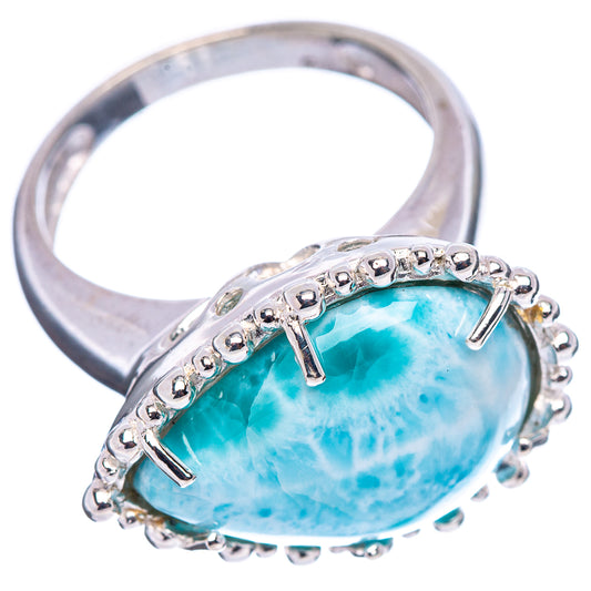 Sterling silver Larimar ring with oval blue gemstone and decorative beaded halo