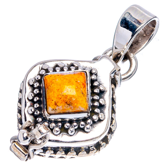 Sterling silver jasper poison-style pendant with orange square center stone and bail