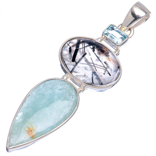 Sterling silver pendant with light blue oval stone and round smoky quartz inset