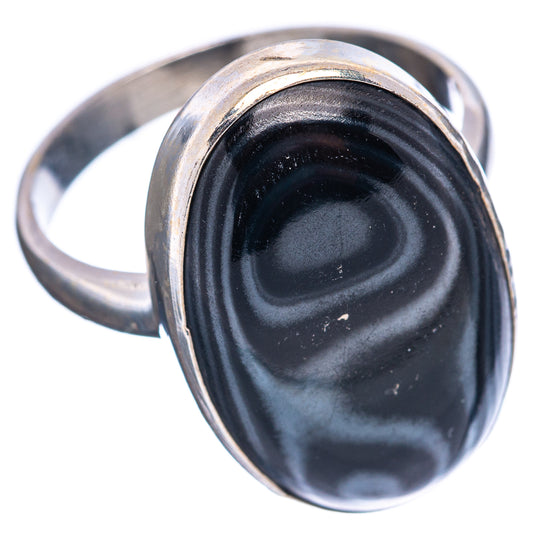 Oval black gemstone ring in .925 sterling silver bezel, side view