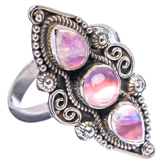 Sterling silver ring with three pink teardrop moonstone stones, filigree side setting