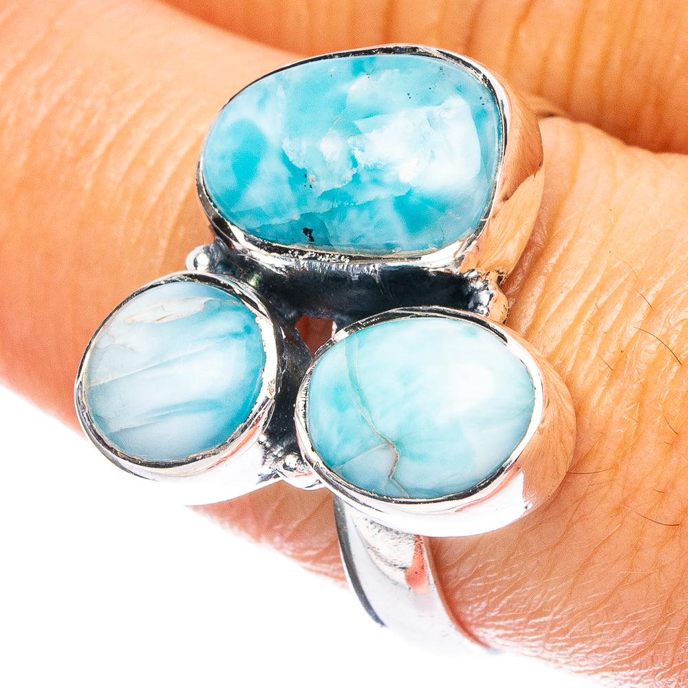 Sterling silver ring with three oval blue larimar cabochons, polished band