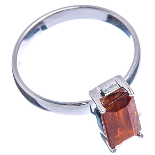 Orange kyanite ring in .925 sterling silver band with rectangular faceted gemstone