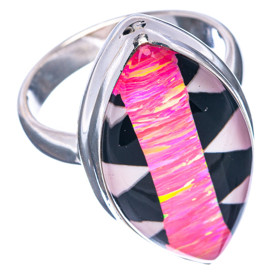 Sterling silver ring with pink opal teardrop gemstone, black and white striped pattern.