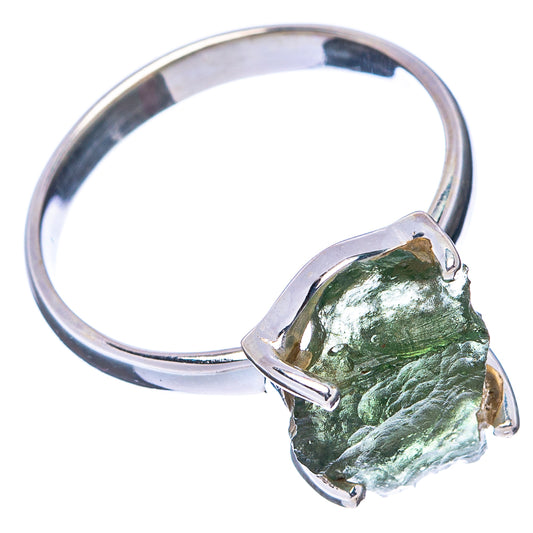 Sterling silver ring with green rough gemstone set in angular prongs, side view
