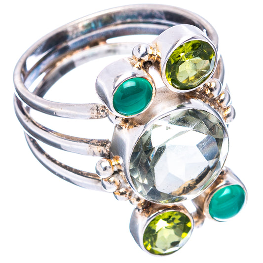 Sterling silver ring with green gemstones and faceted clear center stone, size 7.25