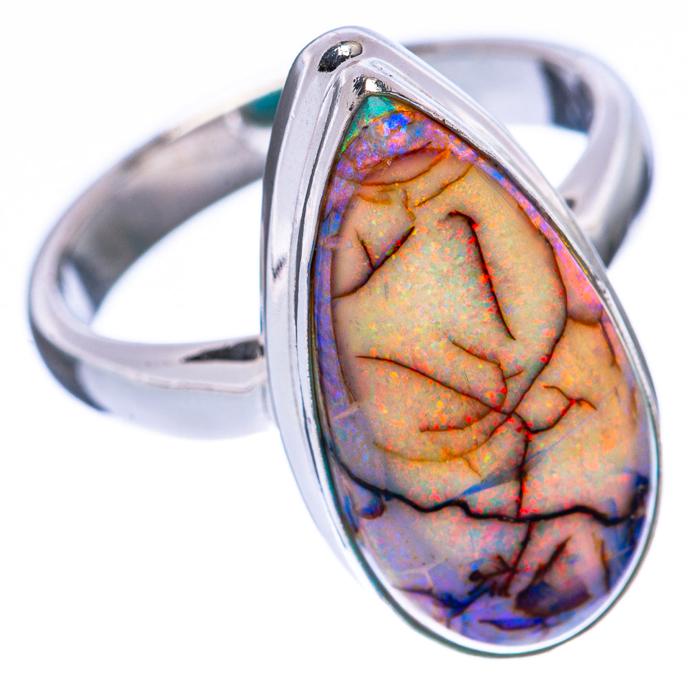 Sterling silver opal ring featuring oval cabochon with fiery multicolor pattern