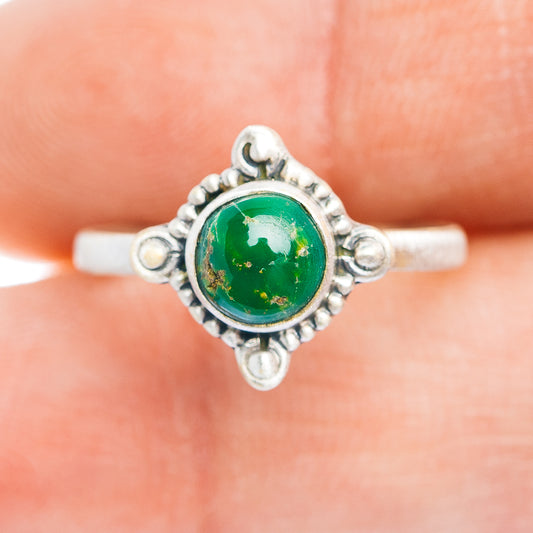 Sterling silver turquoise ring with bezel and star-like corner details, size 7