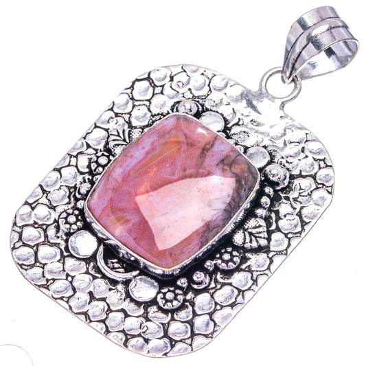 Ocean jasper gemstone pendant, pink oval cabochon in German silver textured frame