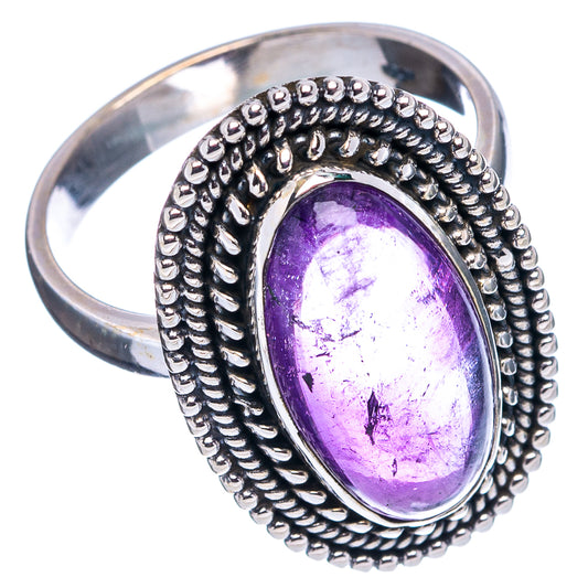 Amethyst ring size 8.25, oval purple gemstone set in silver beaded frame