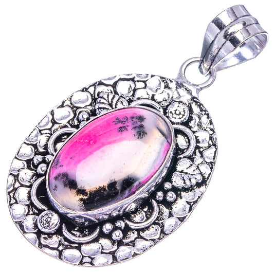 Pink dendritic opal pendant in German Silver, oval pink stone with raised scroll border