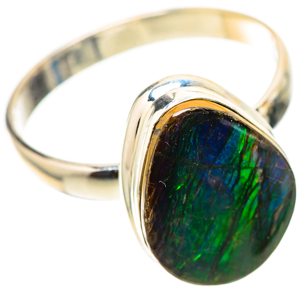 Sterling silver ammolite ring featuring a dark oval iridescent green-blue gemstone