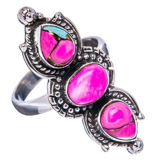 Sterling silver ring with three teardrop pink cabochon stones, openwork side details