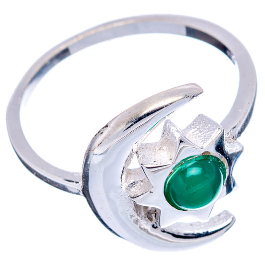 Sterling silver crescent ring with green oval gemstone and cutout star accents