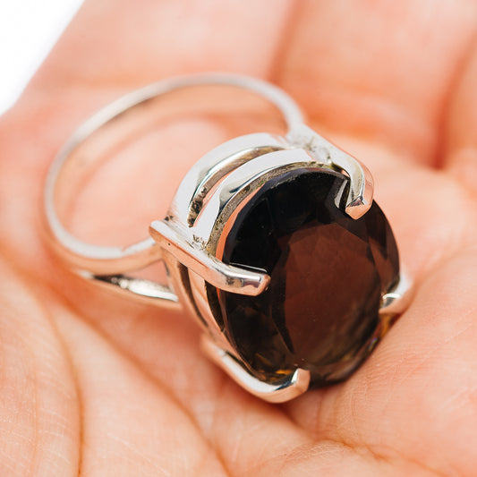 Smoky quartz ring with large oval dark faceted gemstone in sterling silver prong setting