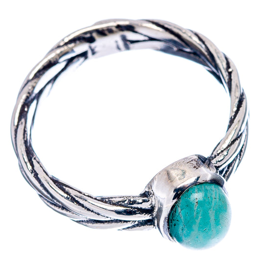 Sterling silver ring with oval turquoise amazonite cabochon, textured swirl band.