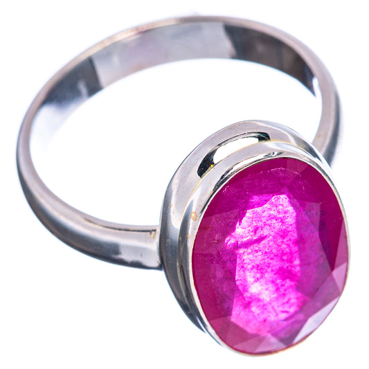 Oval magenta ruby glass-filled ring with .925 sterling silver band, side view