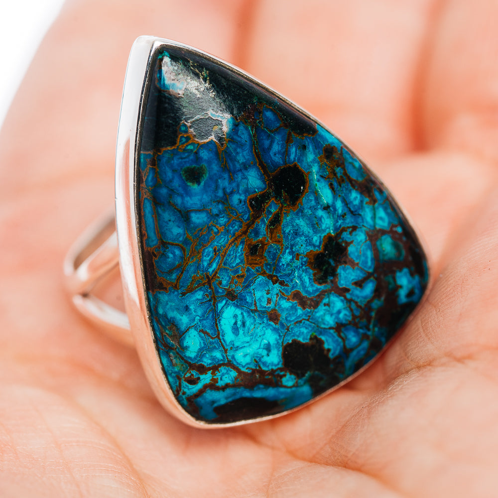 Sterling silver shattuckite ring showing blue teardrop stone and open band
