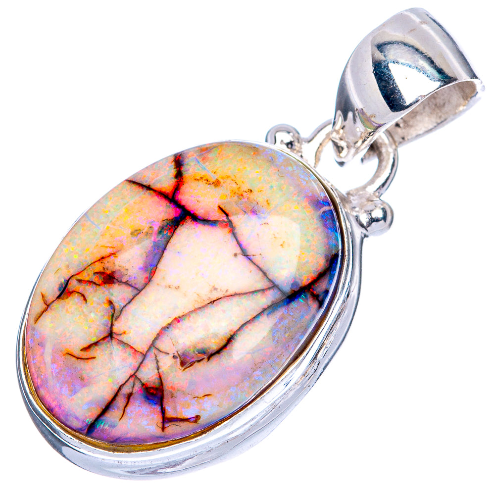 Oval opal pendant on sterling silver bail, carved bezel with bright rainbow flashes