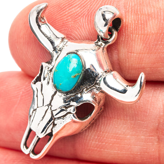 Sterling silver earrings with teal stone drops and curved hook backs
