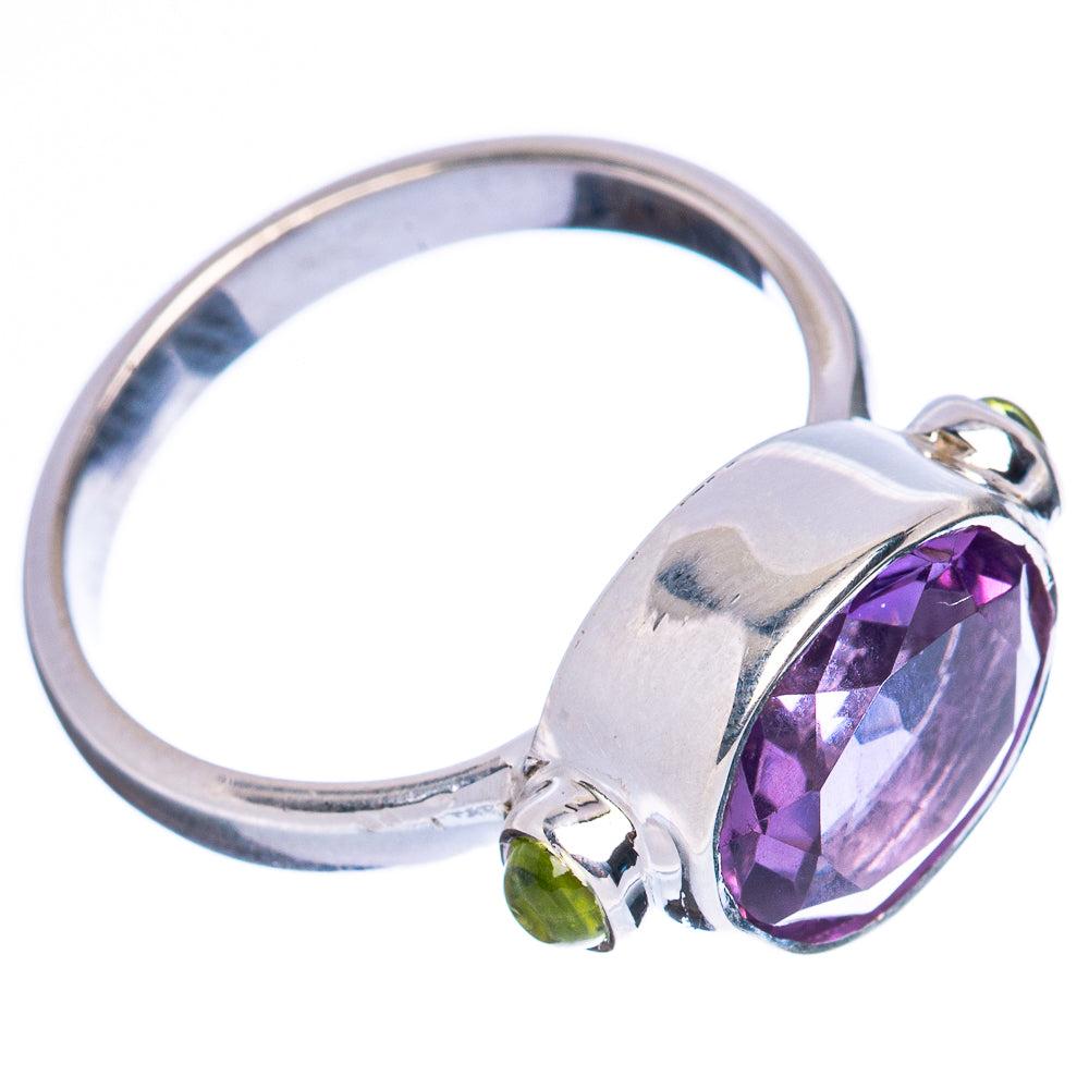 Amethyst faceted ring in 925 sterling silver with green side accent stones