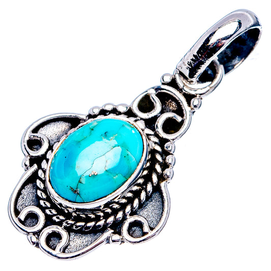 Turquoise oval pendant in .925 sterling silver with detailed scrolling frame and bail