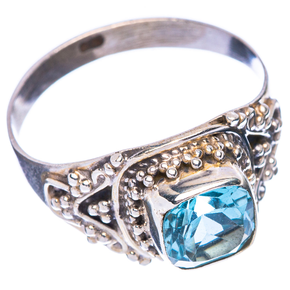 Sterling silver ring with oval blue topaz gemstone and ornate filigree setting, size 8.5