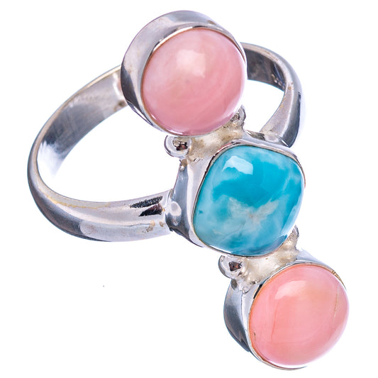 Sterling silver ring with pink opal and blue larimar oval cabochons, side view