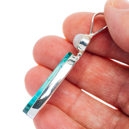 Sterling silver pendant side view with elongated green-and-blue chrysocolla cabochon