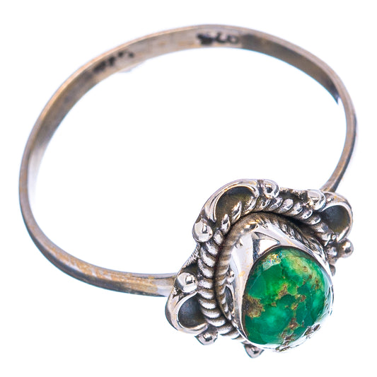 Sterling silver ring with oval green turquoise cabochon, curled filigree band