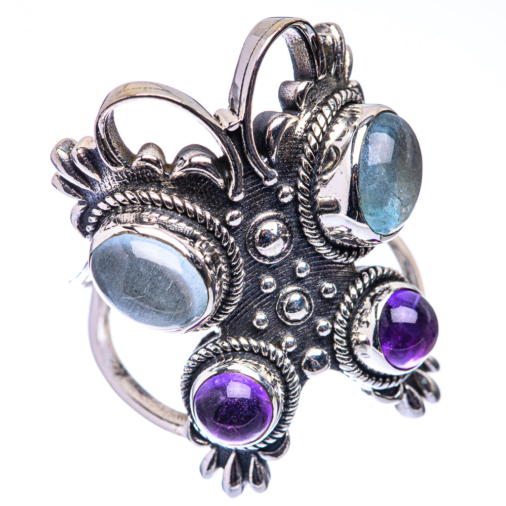 Silver-tone statement ring with aquamarine blue oval stone and three purple amethyst stones