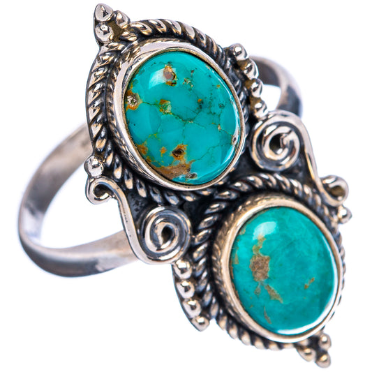 Adjustable sterling silver turquoise ring with oval cabochon stones and twisted scroll details