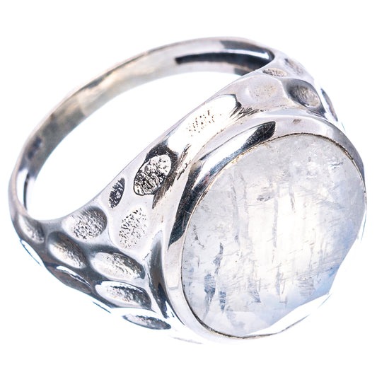 Sterling silver moonstone ring with round white cabochon bezel, detailed side view