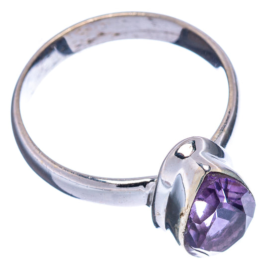 Amethyst gemstone sterling silver ring with faceted oval purple stone, side view
