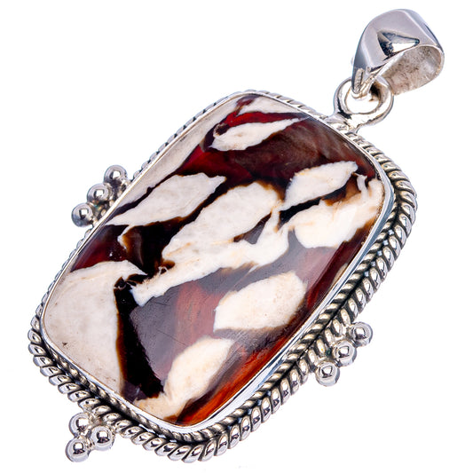 Sterling silver jasper pendant with elongated oval cabochon, rope bezel and bail.