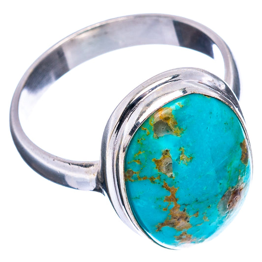 Turquoise cabochon sterling silver ring with oval teal stone and brown veining, side view