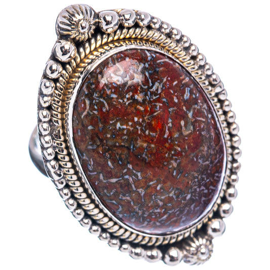Sterling silver oval ring with raised beaded frame and marbled red-brown centerpiece