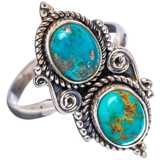 Turquoise oval cabochon adjustable ring in .925 sterling silver with decorative scroll setting