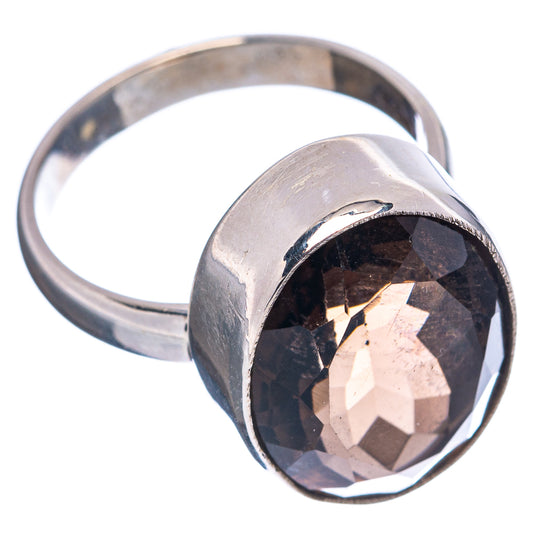 Oval smoky quartz sterling silver ring with dark faceted stone on smooth band
