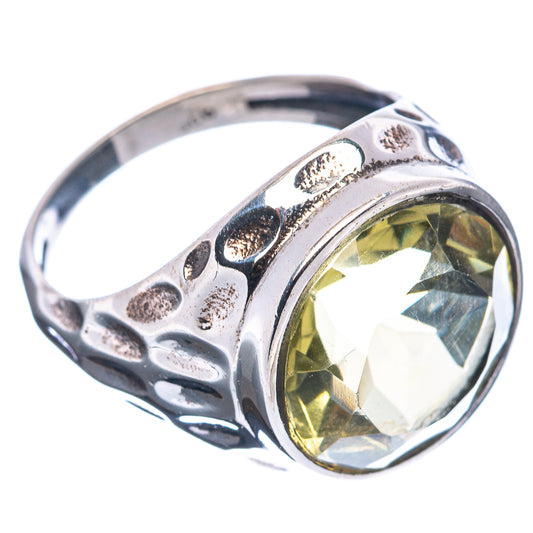 Sterling silver lemon quartz ring, oval yellow-green stone in textured bezel