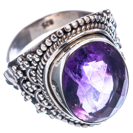 Sterling silver amethyst ring, oval purple stone in ornate bezel on ridged band