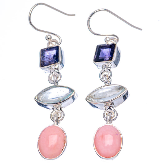 Sterling silver earrings with purple square stones, pink teardrop charms, and oval accents