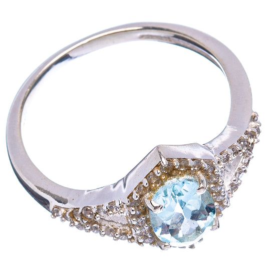 Sterling silver ring with round blue topaz, cubic zirconia halo and pave band, size 5.75