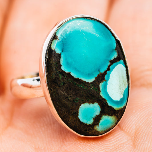 Size 7 oval turquoise cabochon sterling silver ring, angled view