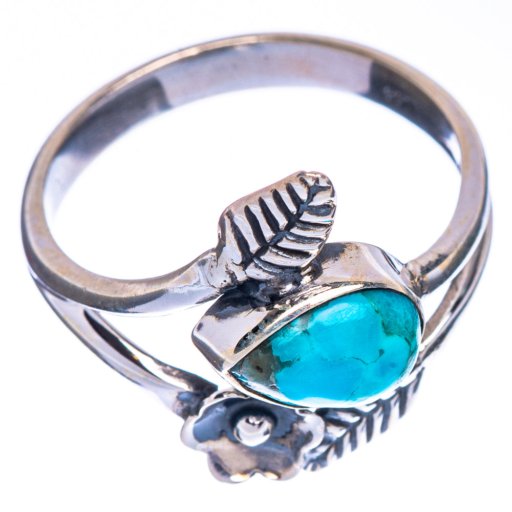 Sterling silver ring with blue turquoise teardrop cabochon and leaf petal settings