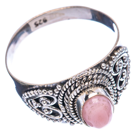 925 sterling silver ring with pink oval opal cabochon and carved side detailing