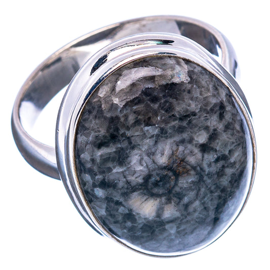 Sterling silver ring with oval dark gray stingray coral cabochon, angled side view