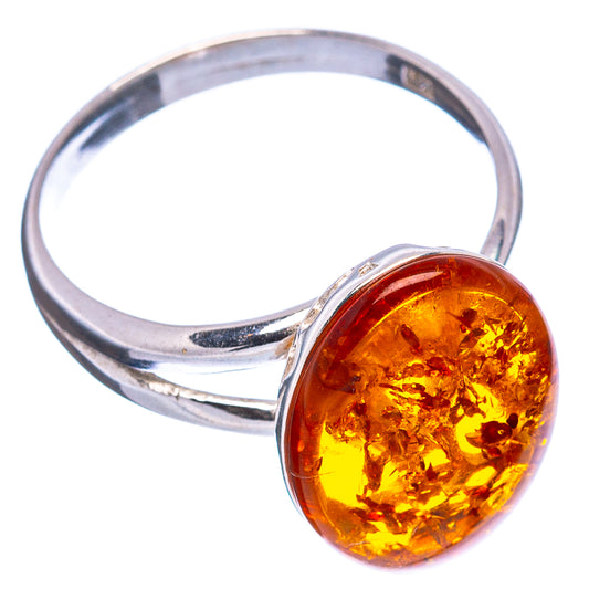 Round amber gemstone set in sterling silver ring, open view shows band setting
